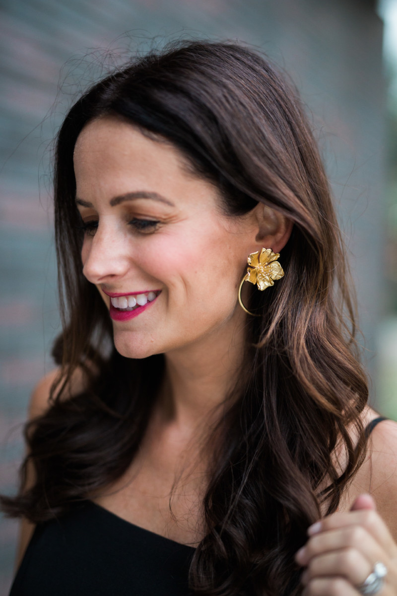 the miller affect wearing gold floral earrings from baublebar