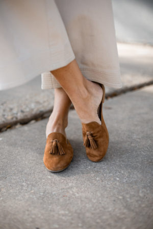 the miller affect wearing suede tassel mules from Banana