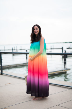 the miller affect wearing a bump friendly rainbow maxi dress