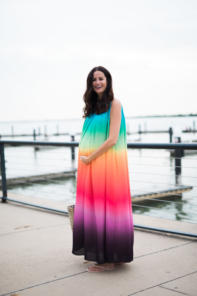 the miller affect wearing a bump friendly rainbow maxi dress