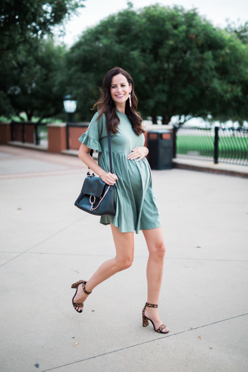 the miller affect wearing an olive swing dress from ASOS