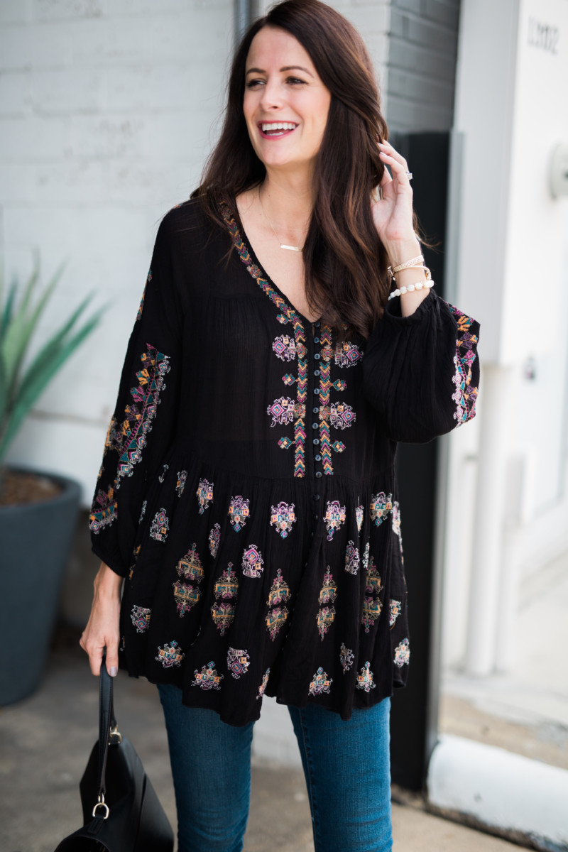 The Miller Affect wearing a black free people blouse