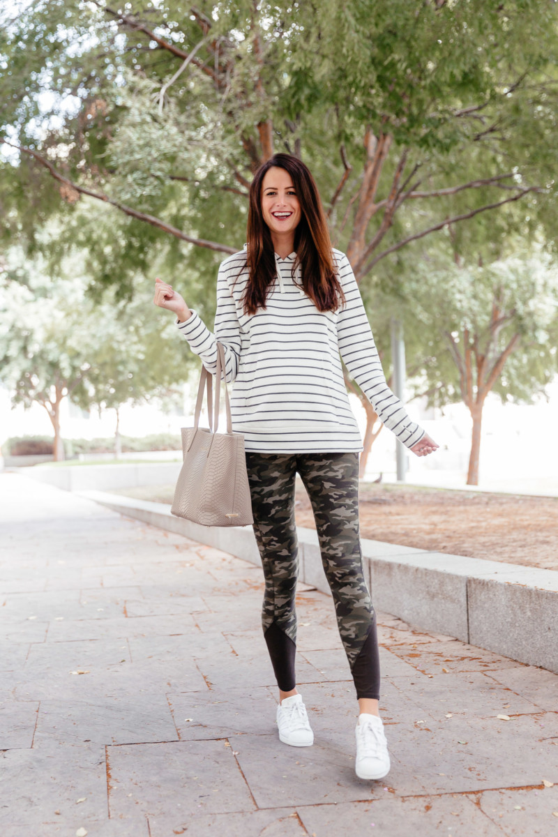 the miller affect wearing a striped hoodie from Motherhood Maternity