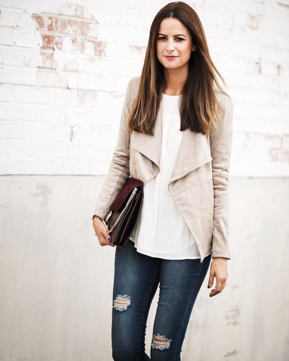the miller affect wearing a taupe suede drape jacket under $100
