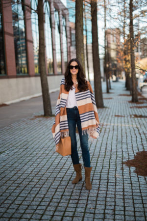the miller affect wearing a striped madewell scarf