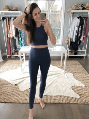 the miller affect wearing navy leggings and bra set from OV