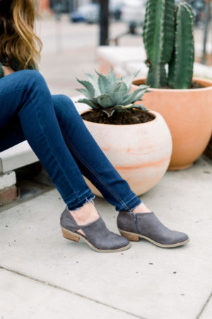 the miller affect wearing low shaft grey booties