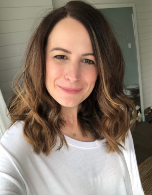 themilleraffect.com with curled short hair and balayage