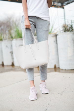 themilleraffect.com carrying a white tote