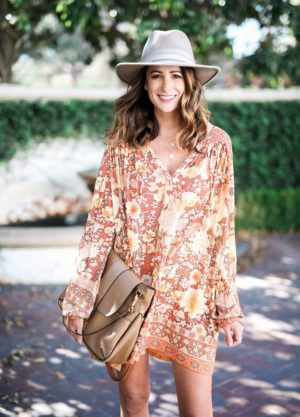 the miller affect wearing boho dress and hat