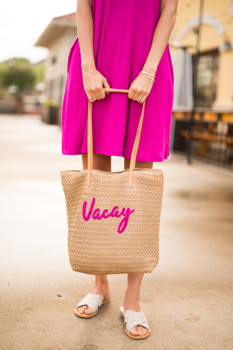 themilleraffect.com carrying a vacay straw bag from walmart