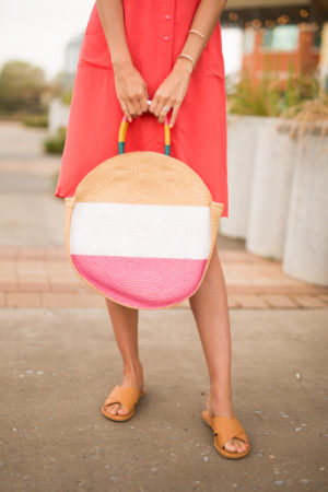themilleraffect.com carrying a multicolor circle straw bag from walmart