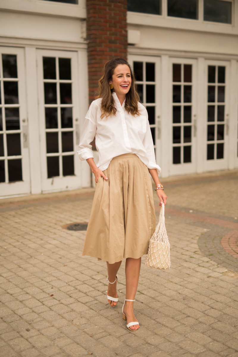 themilleraffect.com wearing a white alex mill button up and khaki midi skirt