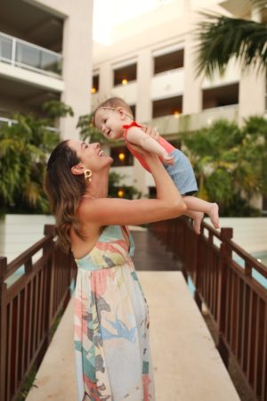 themilleraffect.com wearing an oneil nordstrom dress with her baby girl Miller