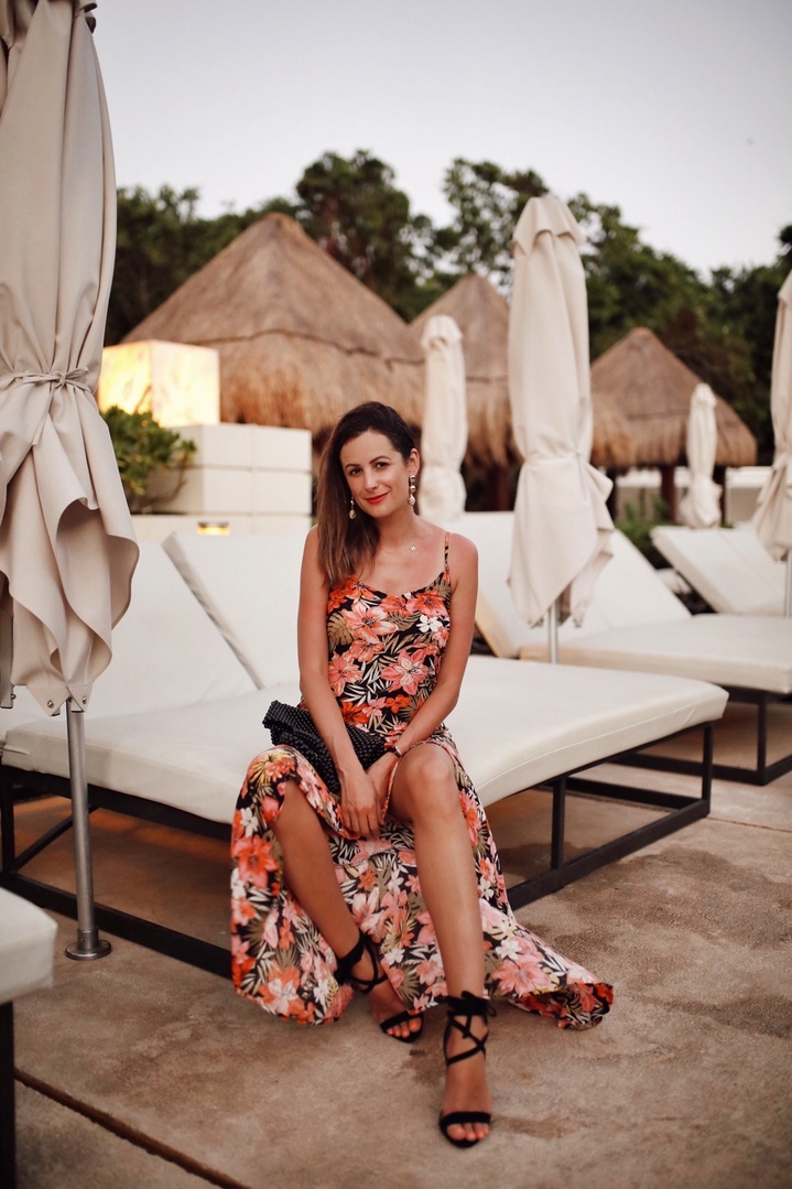 the miller affect wearing a floral maxi dress in playa del carmen