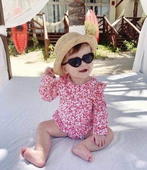themilleraffect.com baby miller wearing an h&m swimsuit and amazon sunglasses