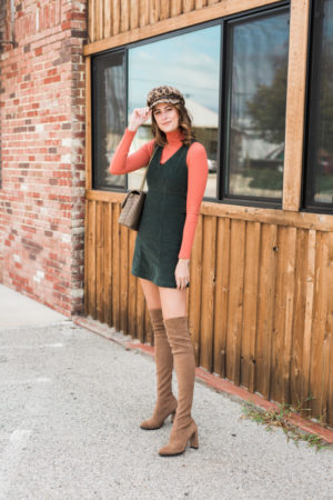 the miller affect layering corduroy dress with orange sweater