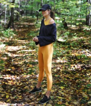 the miller affect wearing yellow leggings on her new england road trip