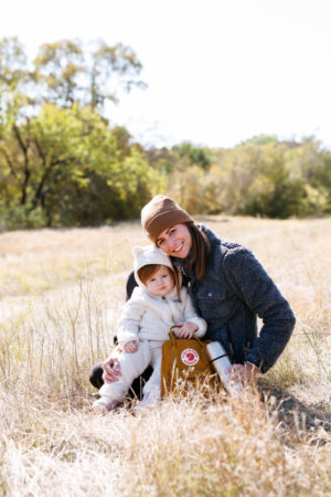 the miller affect and her baby girl wearing their shearling pieces from backcountry