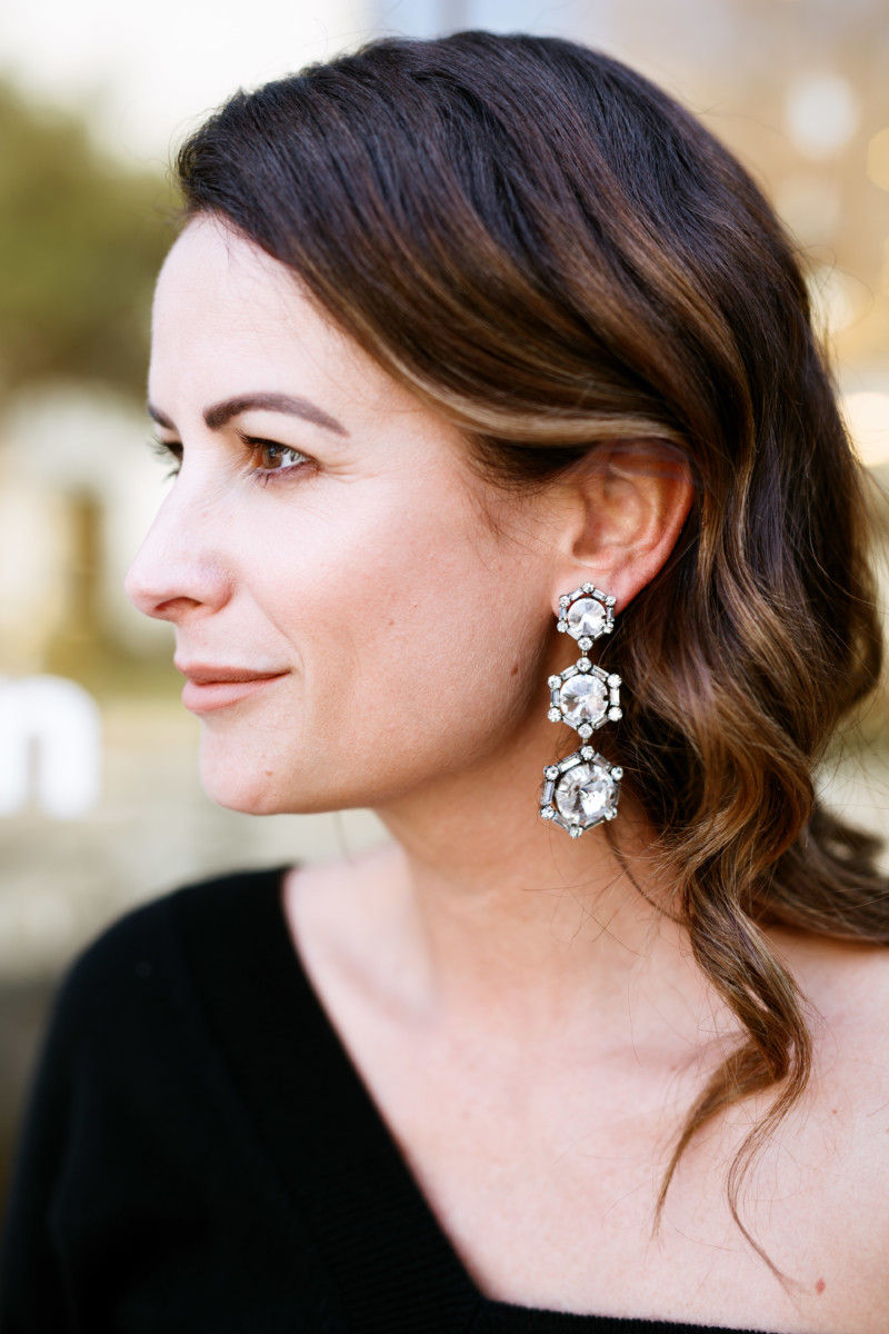 the miller affect wearing crystal drop earrings from INTERMIX