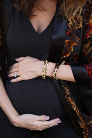 the miller affect wearing a gold heirloom chain bracelet from Victoria Emerson
